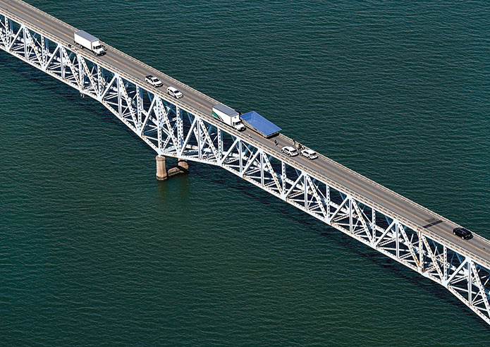 blue pool basin met a box truck on the Norris Bridge